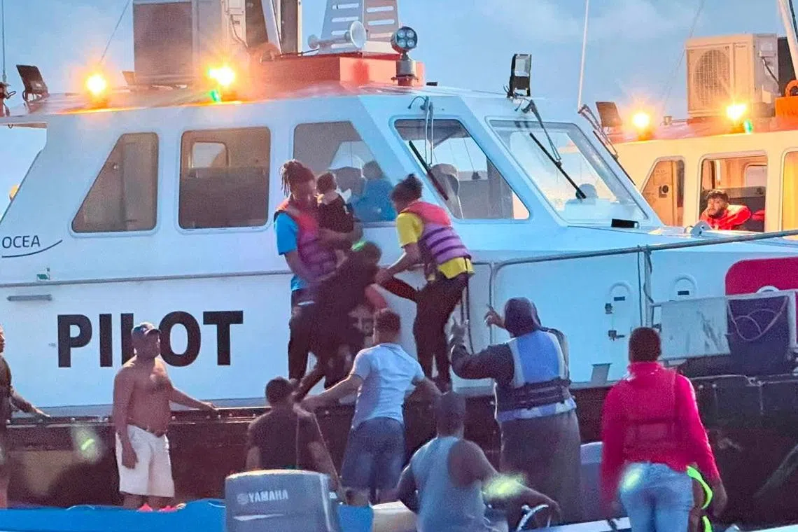 Rescue efforts progress after MV Barima, a ferry carrying people, capsized off the coast of Guyana in South America, in this handout image released on July 19, 2026. Bishop Juan Edghill/Handout via REUTERS    THIS IMAGE HAS BEEN SUPPLIED BY A THIRD PARTY. NO RESALES. NO ARCHIVES. MANDATORY CREDIT     TPX IMAGES OF THE DAY