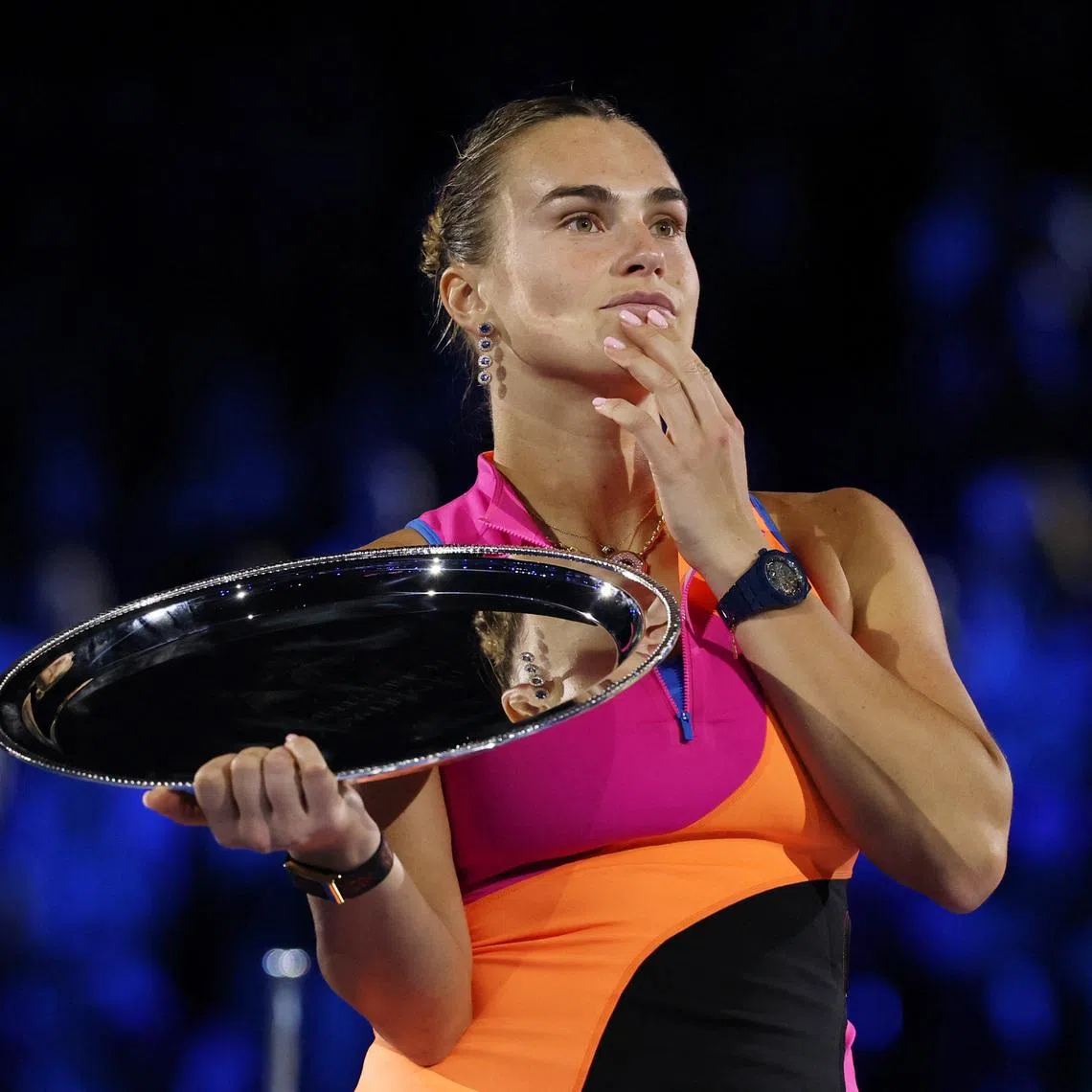 Tennis - Australian Open - Melbourne Park, Melbourne, Australia - January 31, 2026 Belarus' Aryna Sabalenka on the podium with the runners up trophy after the women's singles final against Kazakhstan's Elena Rybakina REUTERS/Hollie Adams