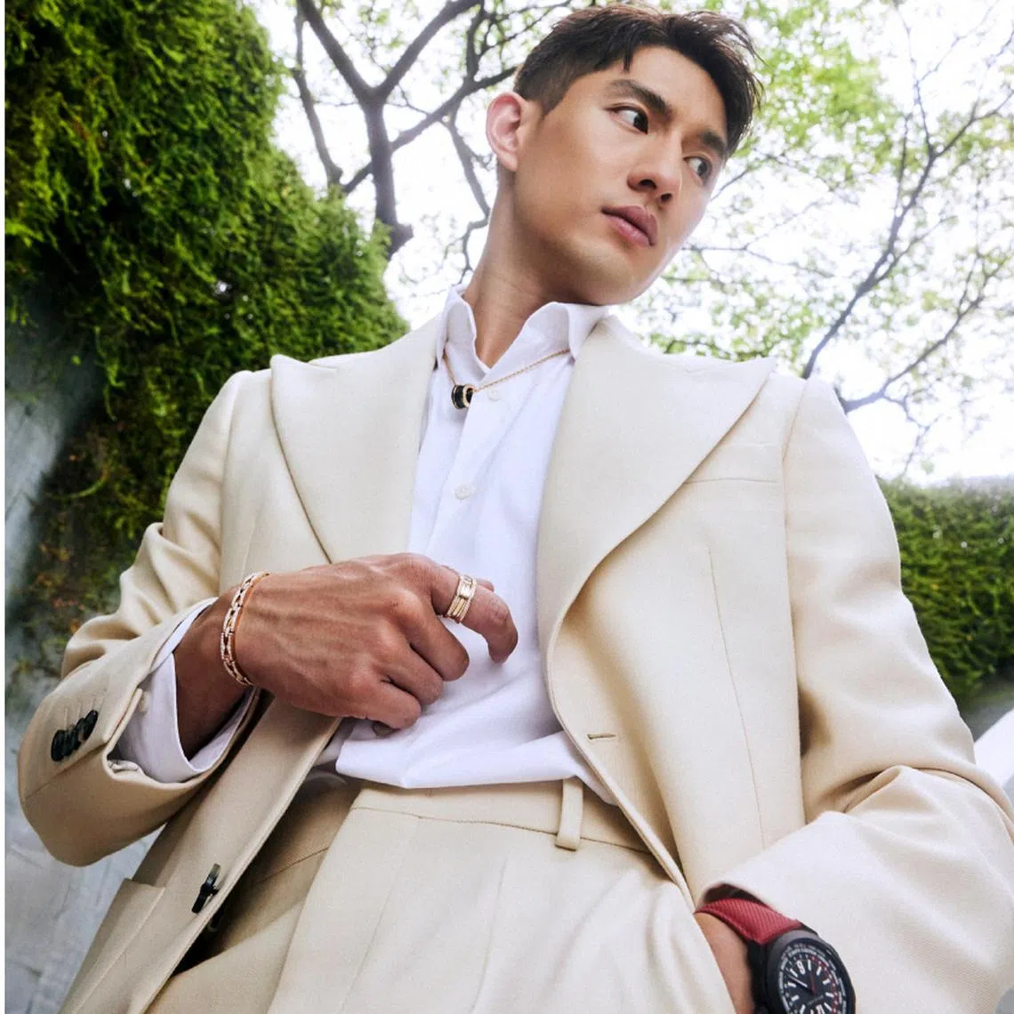 Singaporean actor Ayden Sng wearing the Bvlgari Octo Roma Worldtimer SG60 Edition.