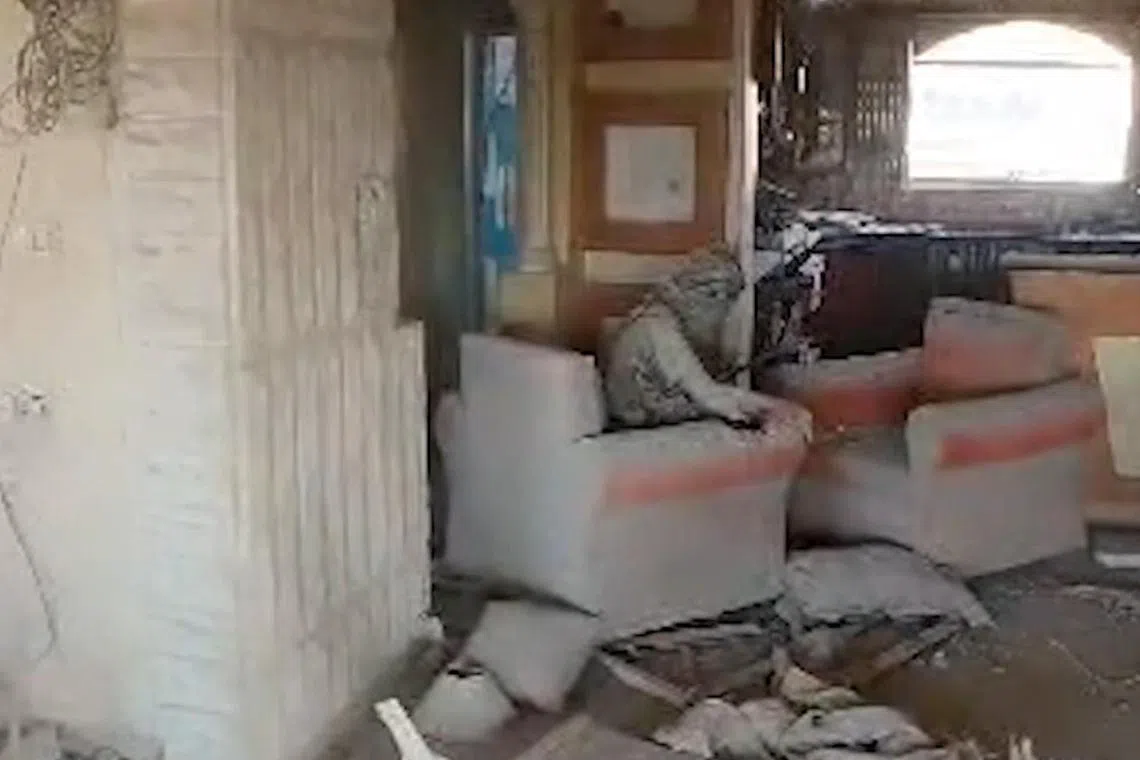 Footage released by the Israeli military showed Sinwar covered in dust sitting in an armchair staring down a drone.