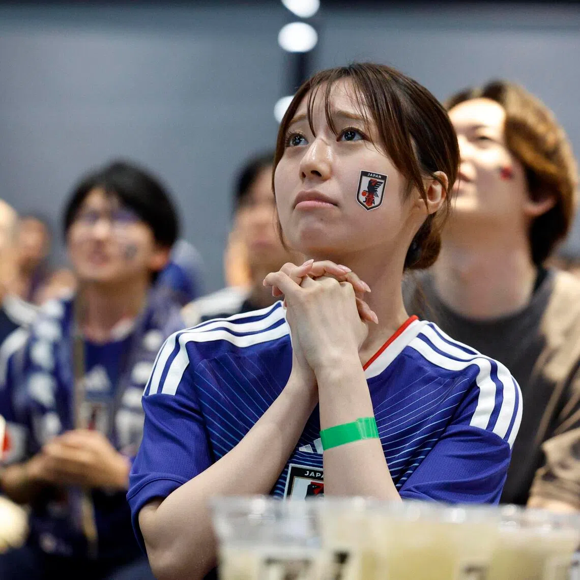 epa13074029 A Japanese soccer team fan reacts during the match of the FIFA World Cup 2026 between Brazil and Japan during a public viewing at ‘blue-ing!’ in Tokyo, Japan, early 30 June 2026.  EPA/FRANCK ROBICHON