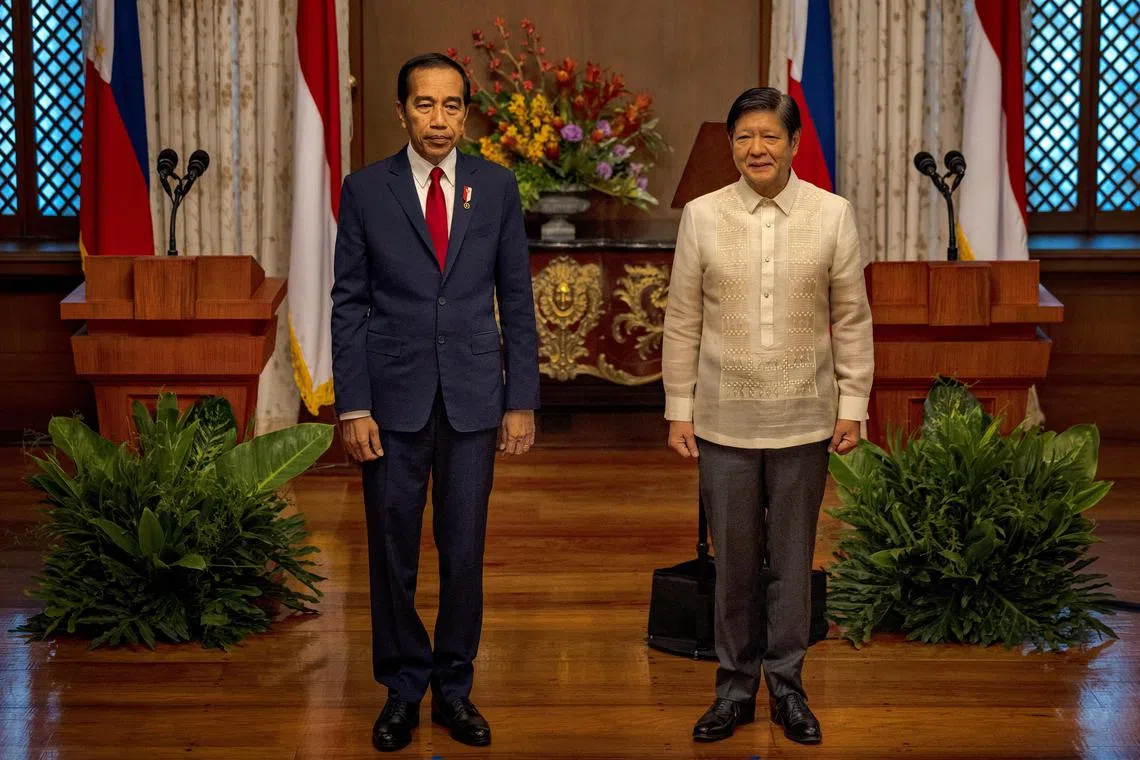 Indonesian President Joko Widodo and Philippine President Ferdinand Marcos Jr. look on before delivering a joint statement at the Malacanang Palace, in Manila, Philippines, January 10, 2024.  