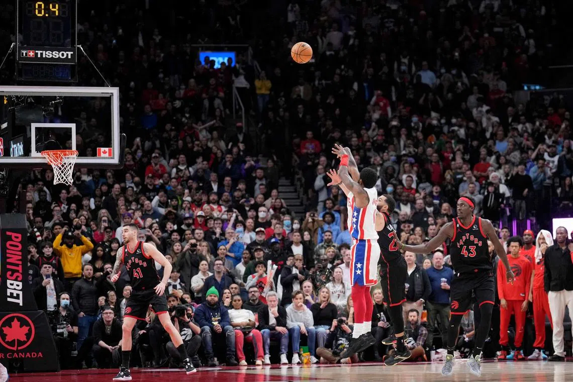 Kyrie Irving of the Brooklyn Nets shoots a game-winning shot to defeat the Toronto Raptors at the Scotiabank Arena.