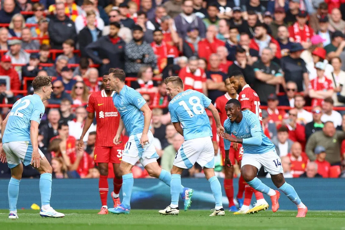 Nottingham Forest winger Callum Hudson-Odoi (far right) peeling away to celebrate his goal against Liverpool at Anfield on Sept 14. Forest won 1-0 in the English Premier League encounter.