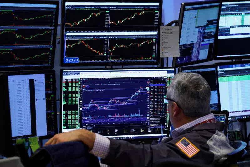 A trader works on the floor at the New York Stock Exchange in New York City.