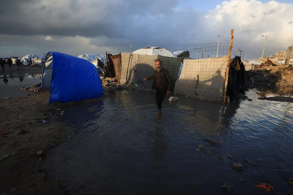 Six dead as Gaza’s displaced struggle to hold ground in torrential rain
