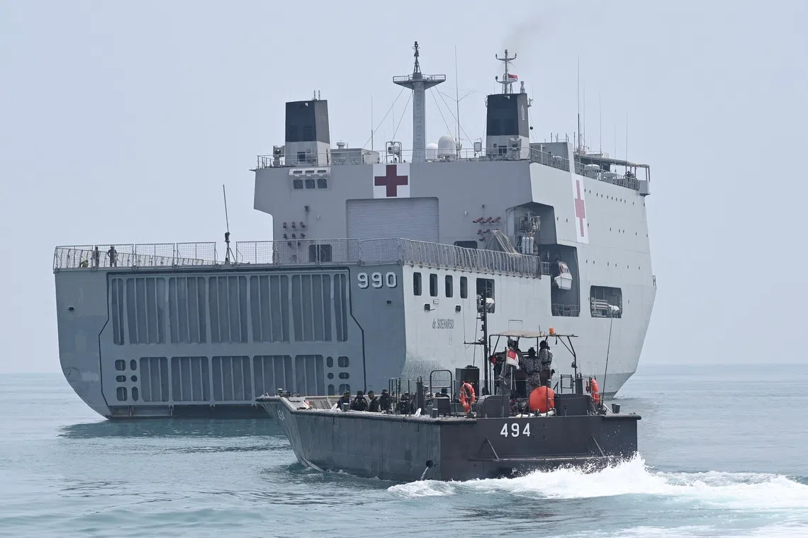 A Republic of Singapore Navy Fast Craft Utility transits from shore to Indonesia’s hospital ship KRI dr. Soeharso during XTR.
