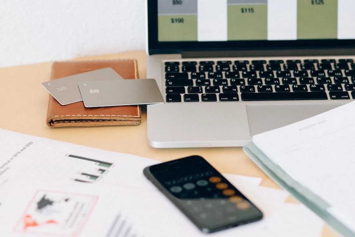 Setting a monthly budget and tracking your expenses to ensure you are spending within your means can be helpful.