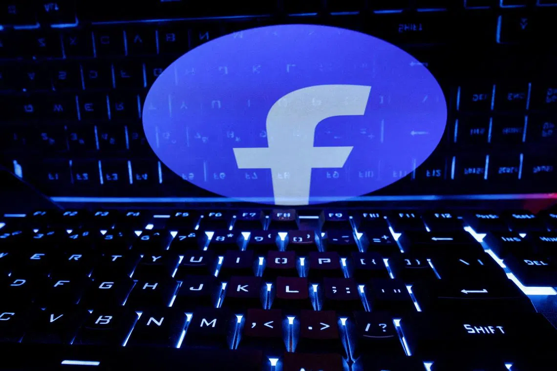 FILE PHOTO: A keyboard is placed in front of a displayed Facebook logo in this illustration taken February 21, 2023. REUTERS/Dado Ruvic/Illustration/File Photo