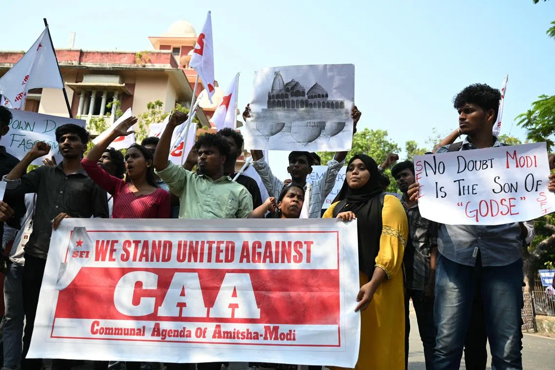 Members of the Students Federation of India (SFI) protest against the implementation of the  Citizenship Amendment Act (CAA) in Chennai on March 12, 2024. India's interior ministry said on March 11, it was enacting a citizenship law that critics say discriminates against Muslims, just weeks before the world's most populous country heads into a general election. (Photo by R.Satish BABU / AFP)
