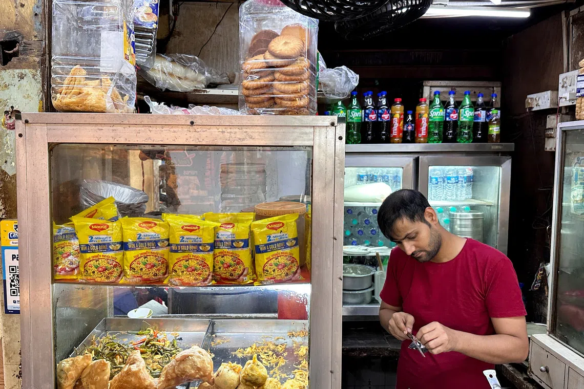 Nestle Maggi 2-Minute Noodles packets are dispayed at a food stall in Mumbai, India, August 21, 2026. Picture taken with a mobile phone. REUTERS/Francis Mascarenhas