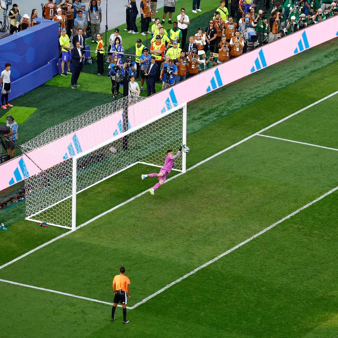 Germany’s Kai Havertz (right) has his shot saved by Paraguay’s Orlando Gill during the penalty shoot-out.