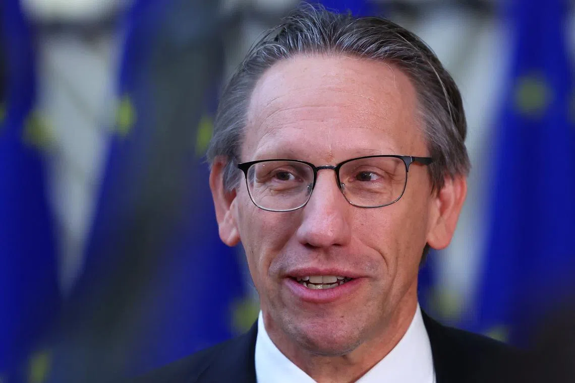 FILE PHOTO: German Finance Minister Joerg Kukies attends the Eurozone finance ministers meeting in Brussels, Belgium, December 9, 2024. REUTERS/Yves Herman/File Photo