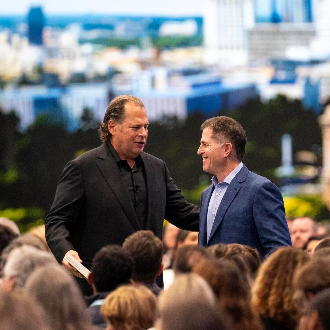 Salesforce CEO Marc Benioff (left) with Mr Michael Dell, CEO of Dell Technologies, a Salesforce customer, at Dreamforce 2025 in San Francisco.