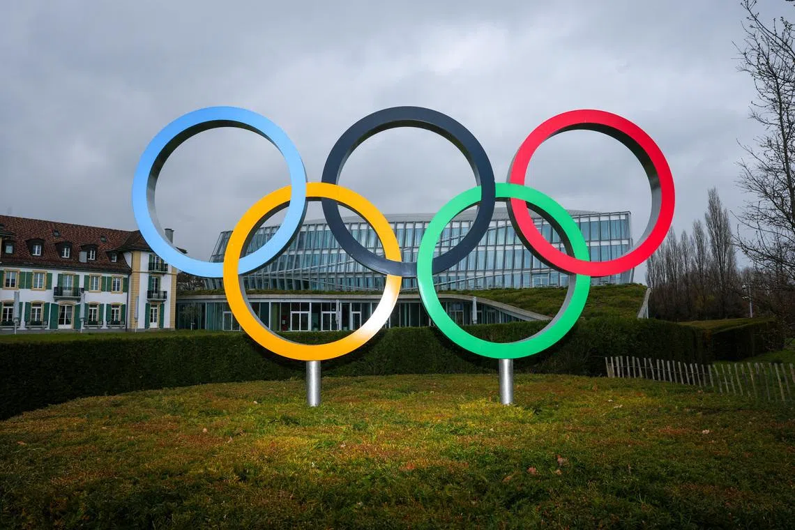 Olympic rings are pictured outside the International Olympic Committee (IOC) during an Executive Board meeting at the Olympic House in Lausanne, Switzerland, March 26, 2026. REUTERS/Denis Balibouse