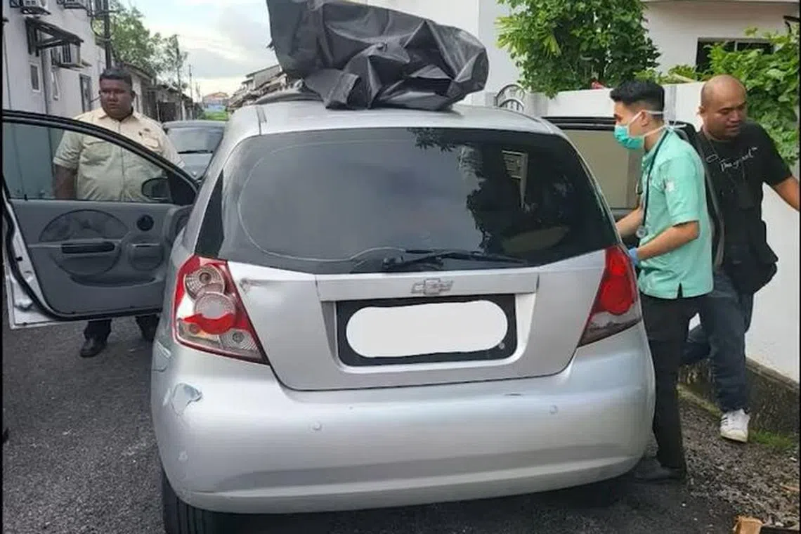 The suspect stabbed the victim several times with a knife and then placed her in a silver Chevrolet car before leaving.