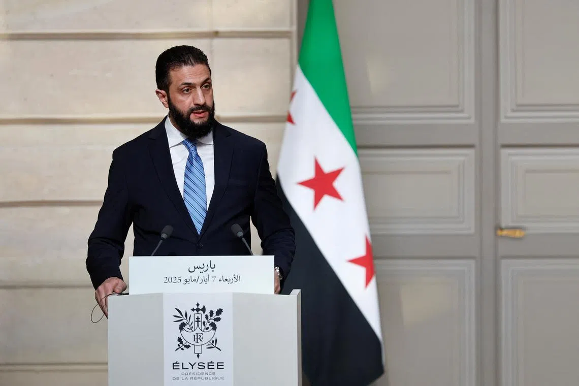 Syrian President Ahmed al-Sharaa speaks during a joint press conference with French President Emmanuel Macron after a meeting at the Elysee Palace in Paris, France, May 7, 2025. REUTERS/Stephanie Lecocq/Pool