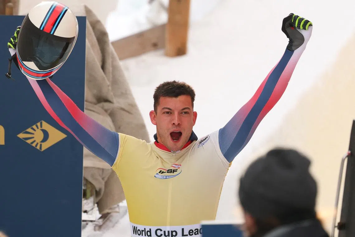 Bobsleigh and Skeleton - IBSF World Championships - St. Moritz-Celerina Olympia Bobrun track, St. Moritz, Switzerland - January 9, 2026 Britain's Matt Weston celebrates after winning the men's skeleton. REUTERS/Denis Balibouse