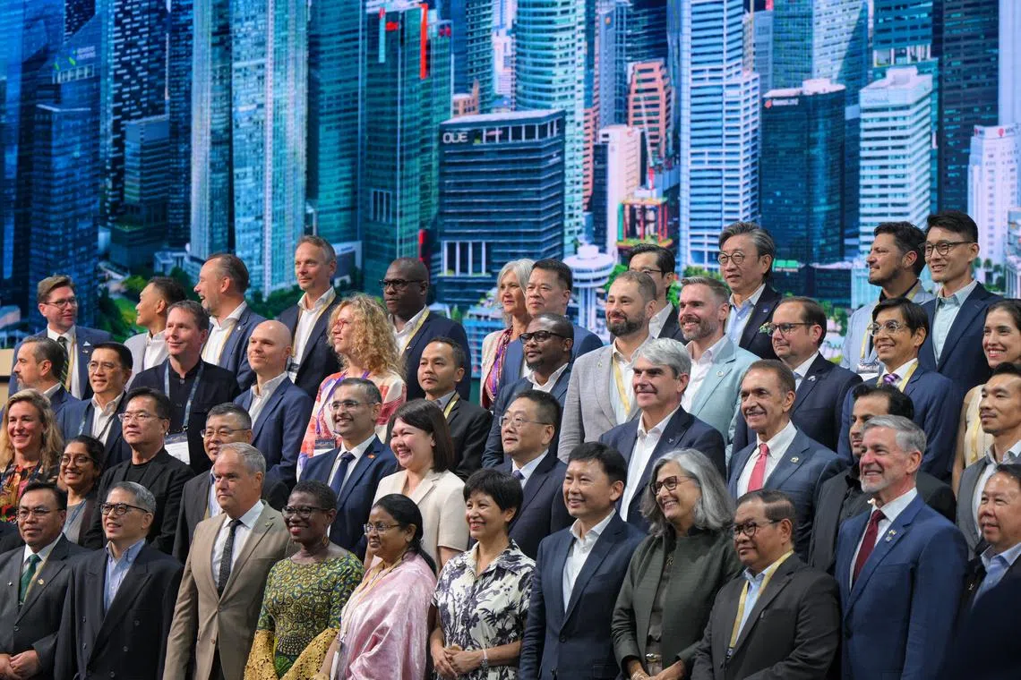 National Development Minister Chee Hong Tat (front row, seventh from left), flanked by Second Minister for National Development Indranee Rajah (sixth from left) and United Nations Human Settlements Programme executive director Anaclaudia Rossbach, with other city leaders at the World Cities Summit 2026 Mayors Forum on June 14.