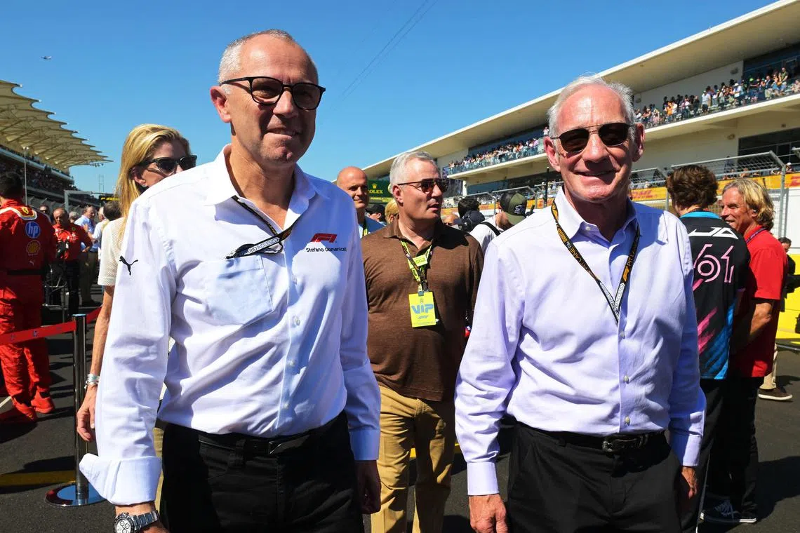 Liberty Media chief Greg Maffei (left) and Formula One Group chief Stefano Domenicali walking on the grid ahead of the US F1 grand prix, in Austin, Texas, on Oct 20. 
