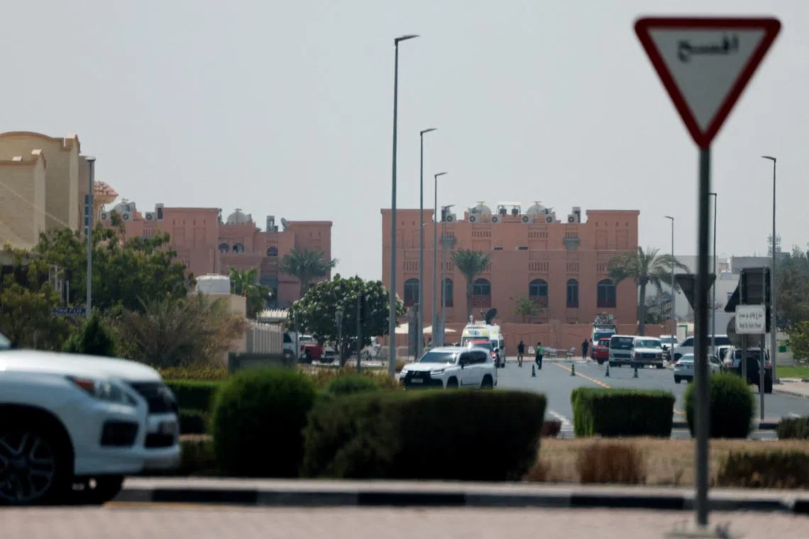 Vehicles are parked in the area of Tuesday's Israeli attack on Hamas leaders, in Doha, Qatar, September 10, 2025. REUTERS/Ibraheem Abu Mustafa