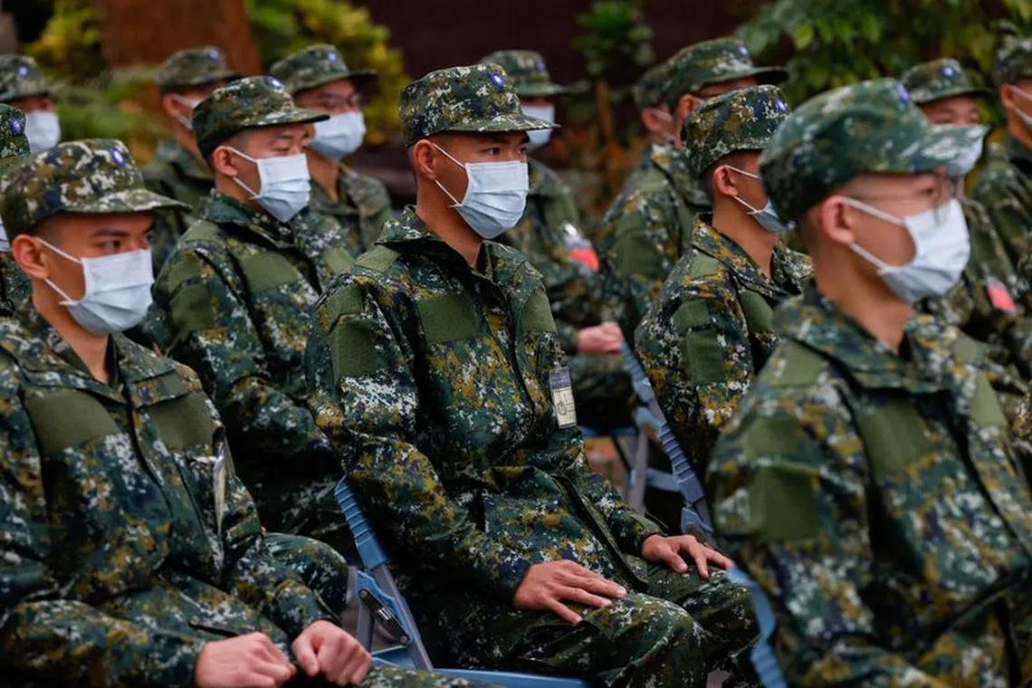 The first batch of new recruits listens to instructions as they set to begin one-year compulsory military service in Taiwan, after the previous four-month conscription period was extended starting 2024, in Taichung, Taiwan January 25, 2024. REUTERS/Ann Wang