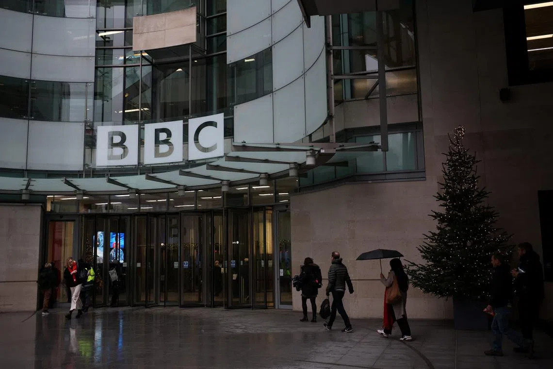 People walk outside the BBC Broadcasting House, after U.S. President Donald Trump sued the BBC for up to $10 billion in damages over edited clips of a speech, in London, Britain, December 16, 2025. REUTERS/Isabel Infantes