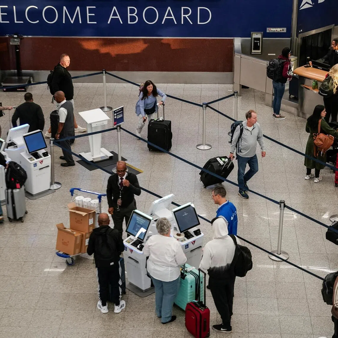 Travellers at Hartsfield-Jackson Atlanta International Airport in Atlanta, Georgia, on Nov 6 amid the US government shutdown.