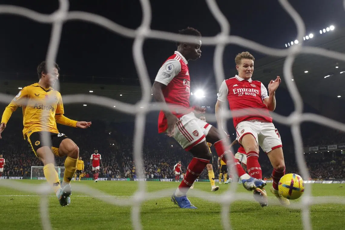 Arsenal's Martin Odegaard scoring their first goal in their  2-0 win over Wolves on Sunday.  