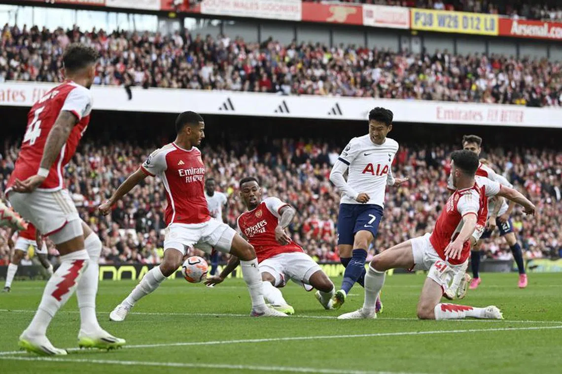 Son's double earns Tottenham 2-2 draw at Arsenal | The Straits Times