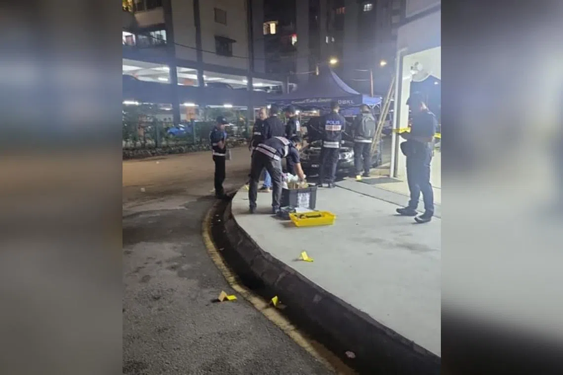 Malaysian police combing the area for clues after a waiter was killed in front of a Selangor restaurant on Dec 29.