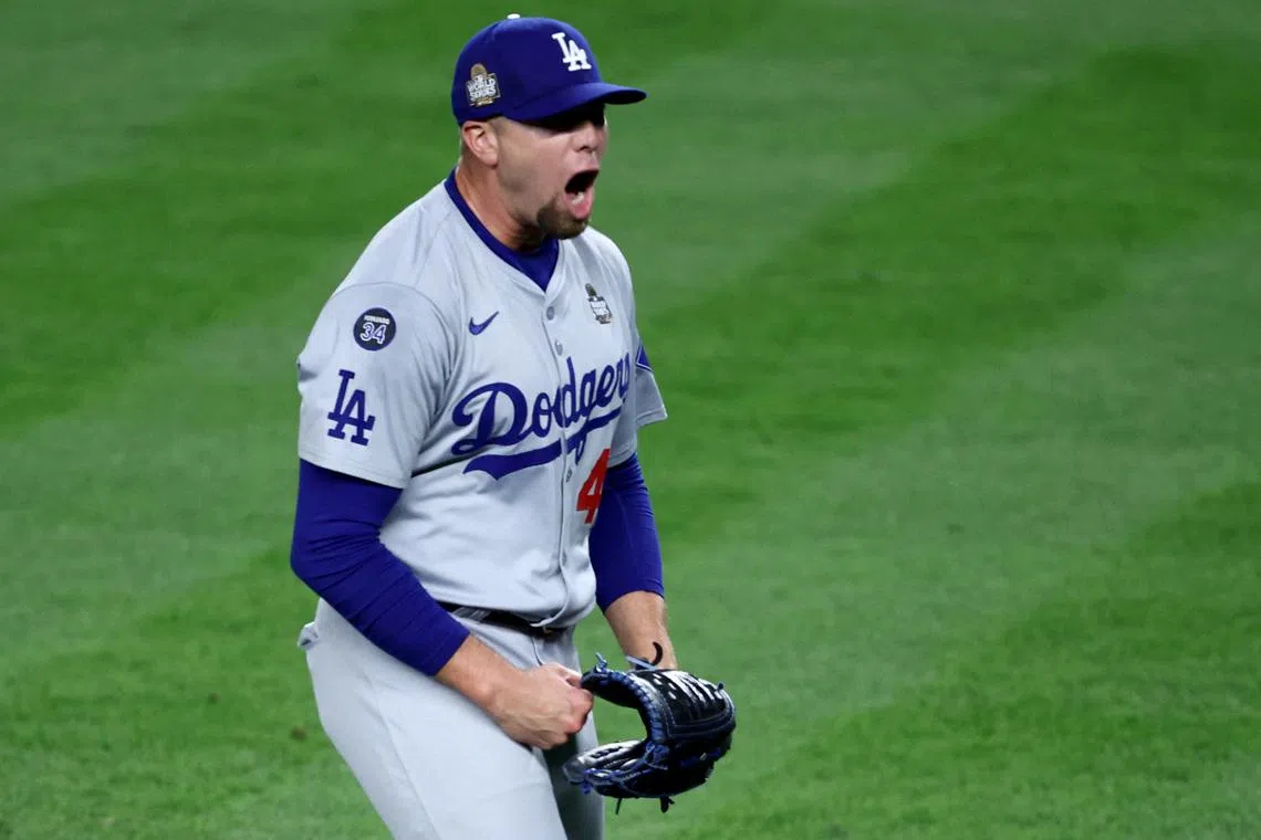 Oct 30, 2024; New York, New York, USA; Los Angeles Dodgers pitcher Blake Treinen (49) celebrates after the end of the eighth inning against the New York Yankees in game five of the 2024 MLB World Series at Yankee Stadium. Mandatory Credit: Wendell Cruz-Imagn Images/ File Photo