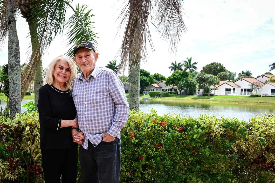 World War II veteran Harold Terens, 100, and his fiancee Jeanne Swerlin, 96, pose for a photo during an interview, April 3, 2024, in Boca Raton, Florida. Americans Harold Terens and Jeanne Swerlin promise their courtship is "better than Romeo and Juliet": He is 100, she's 96, and they marry next month in France, where the groom-to-be served during World War II. (Photo by GIORGIO VIERA / AFP)