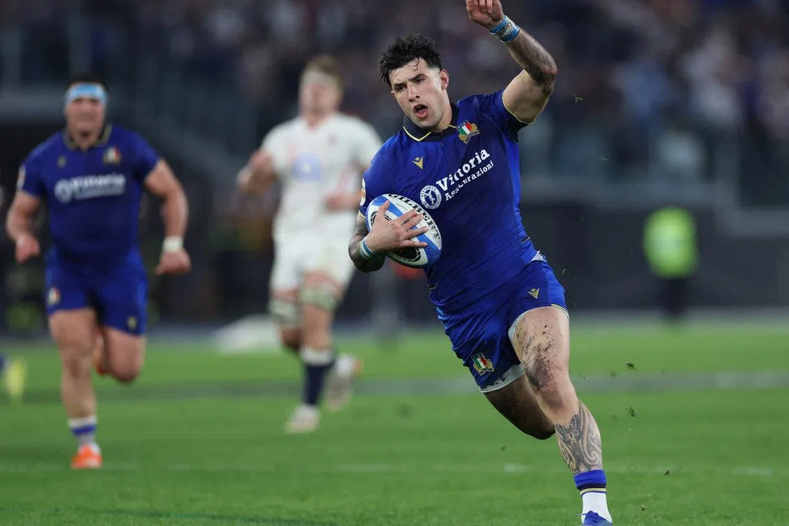 Rugby Union - Six Nations Championship - Italy v England - Stadio Olimpico, Rome, Italy - March 7, 2026 Italy's Tommaso Menoncello in action before scoring a try REUTERS/Ciro De Luca