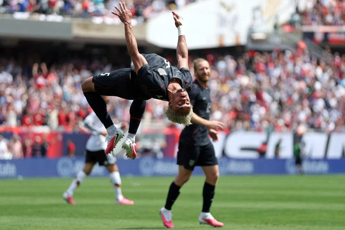 CHICAGO, ILLINOIS - JUNE 06: 


Antonee Robinson #5 of United States celebrates after scoring his team's first goal during the international friendly match between United States and Germany at Soldier Field on June 06, 2026 in Chicago, Illinois.   Jamie Squire/Getty Images/AFP (Photo by JAMIE SQUIRE / GETTY IMAGES NORTH AMERICA / Getty Images via AFP)