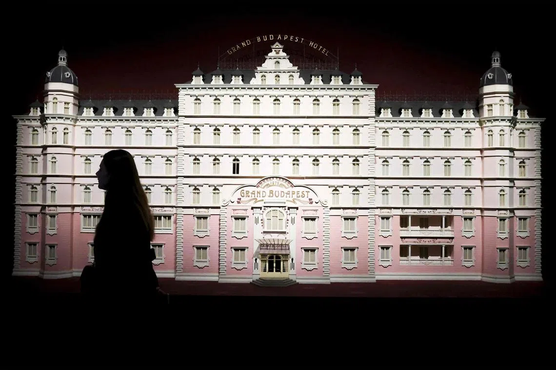 A person visits the exhibition dedicated to US film director Wes Anderson at the Cinematheque Francais in Paris on March 17, 2025.