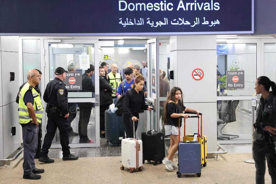 Passengers from diverted flydubai flight FZ1073 arriving back in Israel on Sept 30. Israel said a co-pilot on the flight to Tel Aviv had stabbed the pilot and attempted to crash the plane.