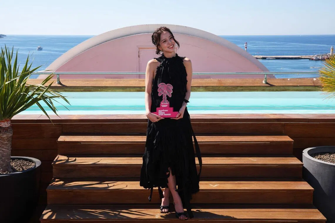 Jisoo poses with the Rising Star Award at Canneseries in southern France on April 24, 2026. 