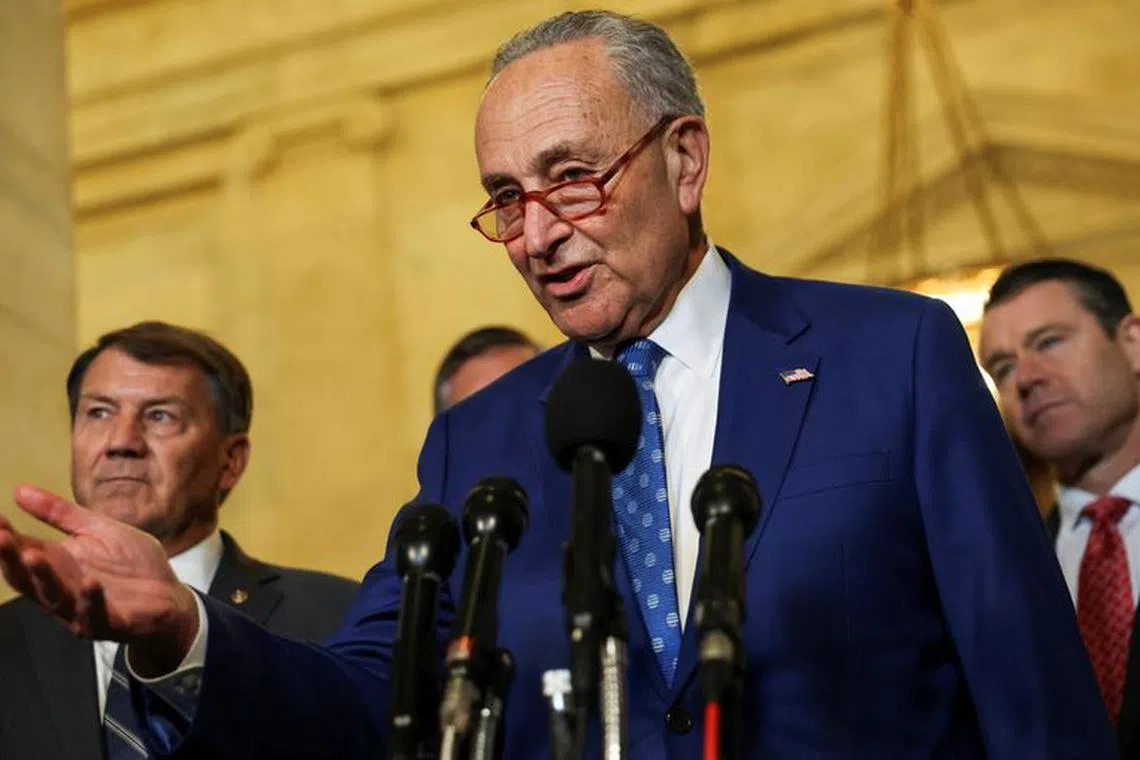 FILE PHOTO: U.S. Senate Majority Leader Chuck Schumer (D-NY) addresses a press conference during a break in a bipartisan Artificial Intelligence (AI) Insight Forum for all U.S. senators at the U.S. Capitol in Washington, U.S., September 13, 2023. REUTERS/Julia Nikhinson