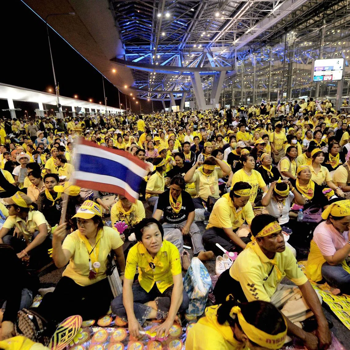 Anti-government protesters shouting slogans during a protest at Suvarnabhumi international airport in Bangkok on Nov 25, 2008. 
