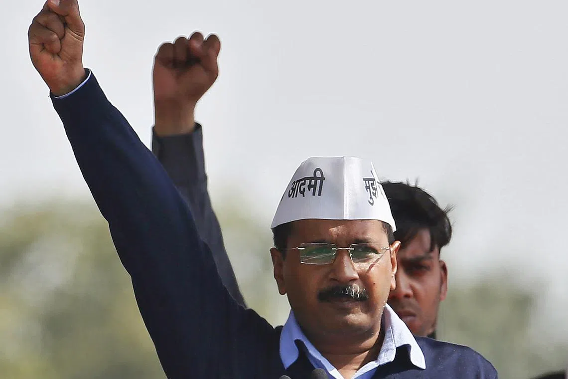 FILE PHOTO: Arvind Kejriwal, chief of Aam Aadmi (Common Man) Party (AAP), shouts slogans after taking the oath as the new chief minister of Delhi during a swearing-in ceremony at Ramlila ground in New Delhi February 14, 2015. REUTERS/Anindito Mukherjee/File Photo