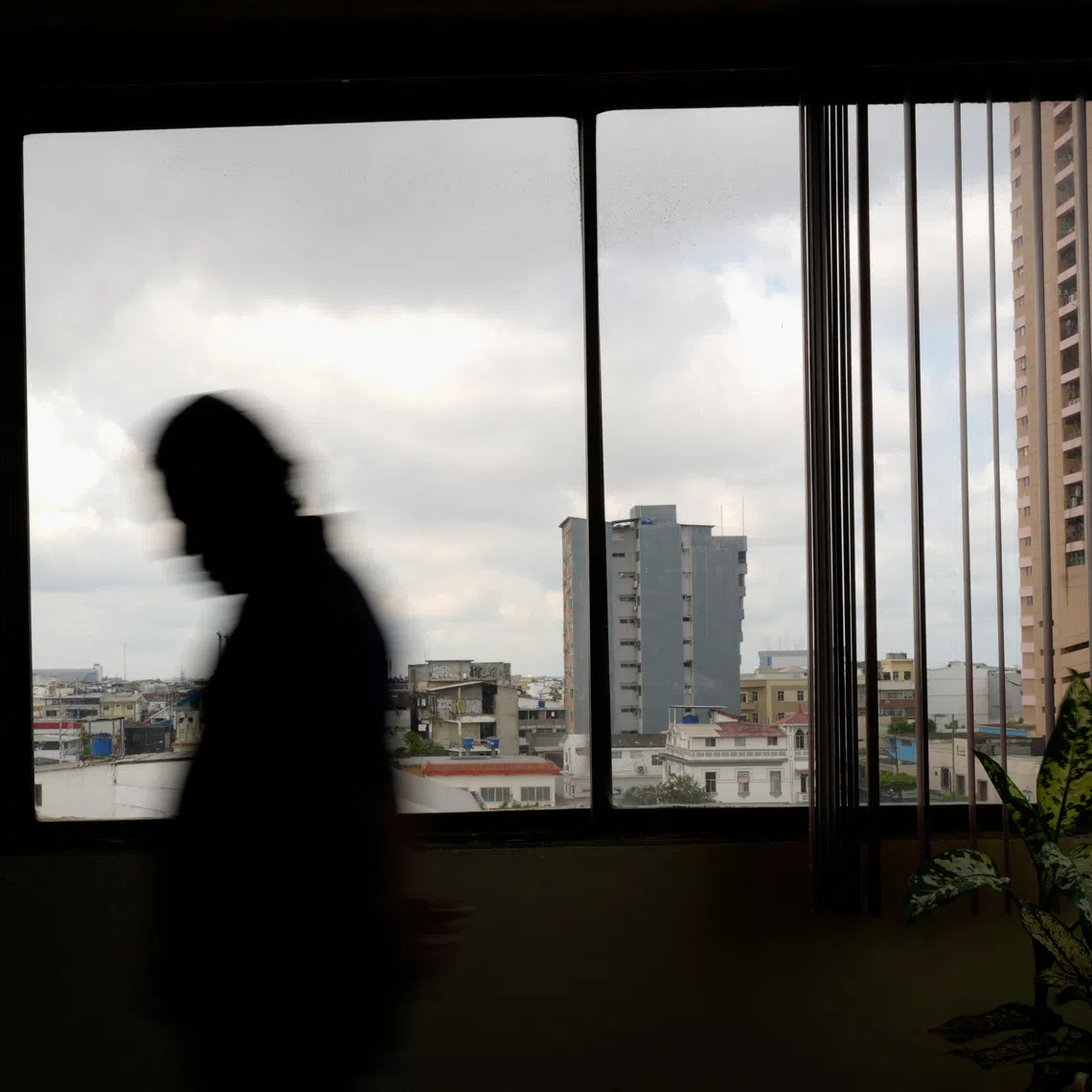 A man displaced by gang violence poses for a photo during an interview as Ecuador experiences a sharp rise in internal displacement amid expanding criminal group control and territorial disputes, in Guayaquil, Ecuador, July 20, 2026. REUTERS/Santiago Arcos