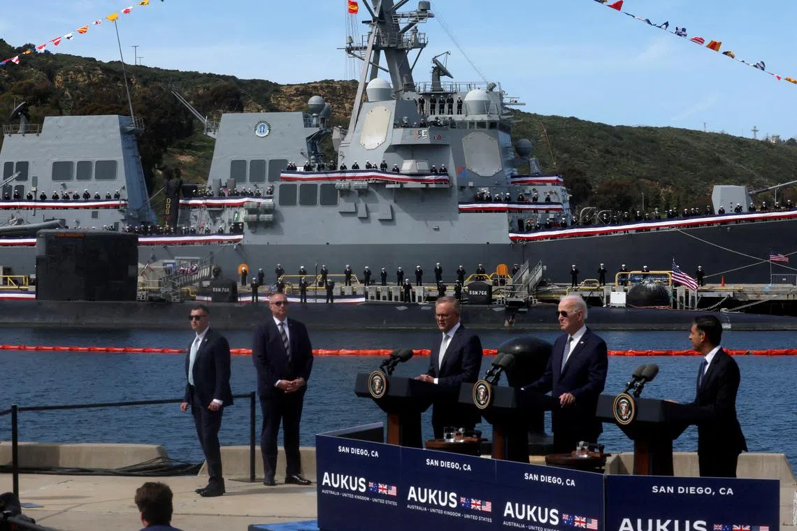 FILE PHOTO: U.S. President Joe Biden, Australian Prime Minister Anthony Albanese and British Prime Minister Rishi Sunak deliver remarks on the Australia - United Kingdom - U.S. (AUKUS) partnership, after a trilateral meeting, at Naval Base Point Loma in San Diego, California U.S. March 13, 2023. REUTERS/Leah Millis/File Photo