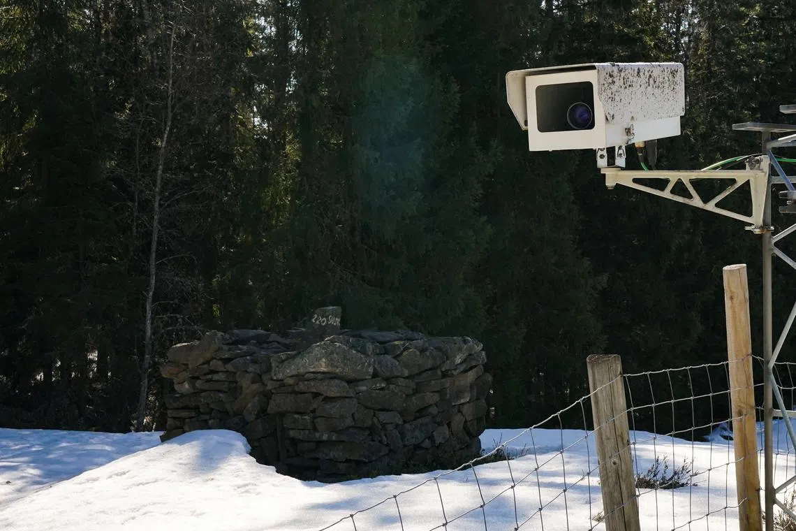 A view of surveillance camera installed near border fence with Russia in Pelkola, Finland April 14, 2023. REUTERS/Janis Laizans/File Photo