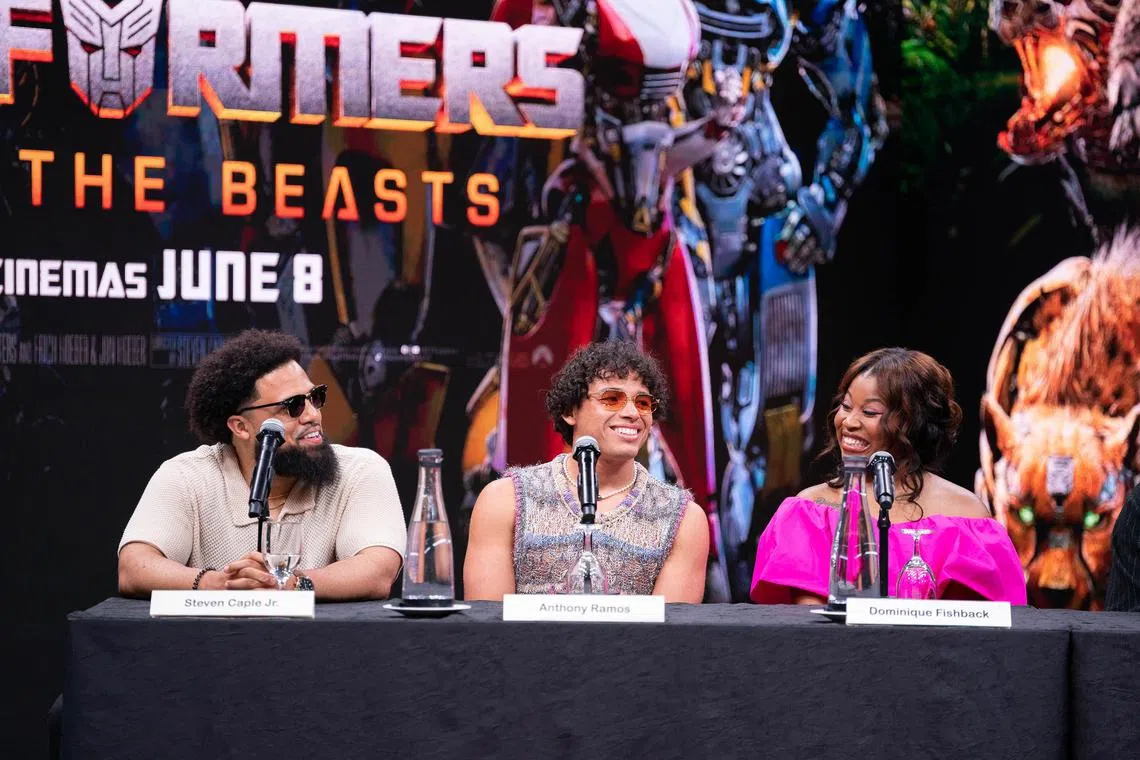jotrans29 - ST20230526_202345280640 /Brian Teo/BrianTeo-jotrans29-1 (from left):
Steven Caple Jr, film director; Anthony Ramos, Actor; Dominique Fishback, Actress, at the Transformer Rise of the Beast Press Conference at Marina Bay Sands Expo and Convention Centre on 26 May 2023.