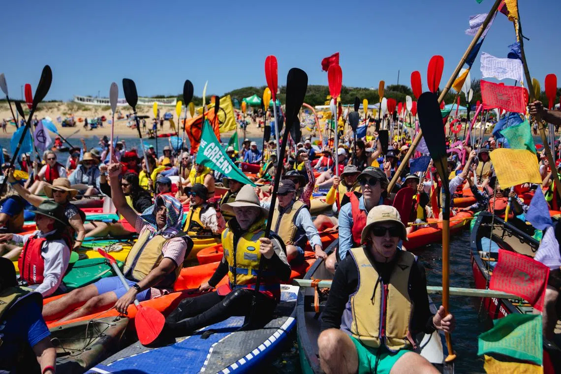 Activists staged a floating blockade of Australia's largest coal port in Newcastle over the weekend, imploring the government to end the country’s long reliance on fossil fuel exports.