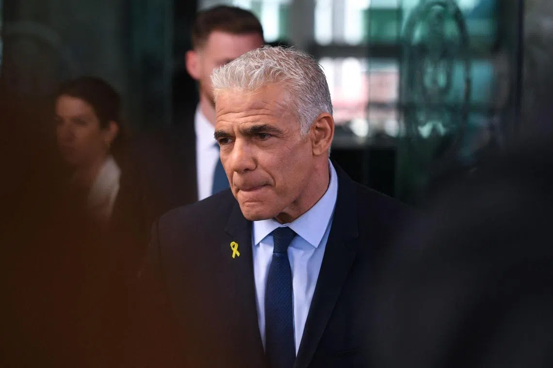 Israeli opposition leader Yair Lapid speaking to reporters after meeting  US Secretary of State Antony Blinken at the US State Department on April 8.