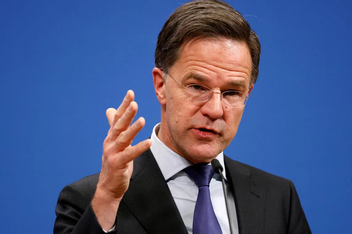 FILE PHOTO: NATO Secretary General Mark Rutte speaks during a press conference at NATO headquarters in Brussels, Belgium Monday, Feb. 3, 2025.     Omar Havana/Pool via REUTERS/File Photo