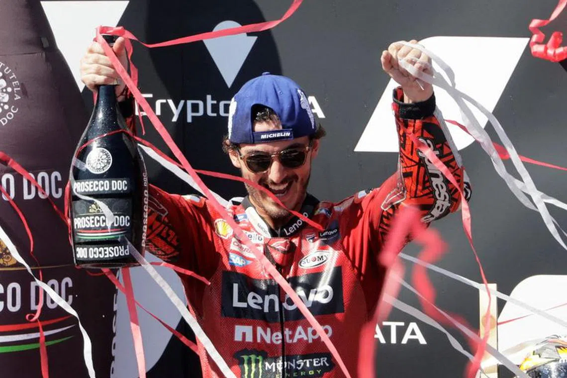 FILE PHOTO-MotoGP - Austrian Grand Prix - Red Bull Ring, Spielberg, Austria - August 20, 2023 Ducati Lenovo Team's Francesco Bagnaia celebrates winning the race on the podium REUTERS/Leonhard Foeger/File Photo