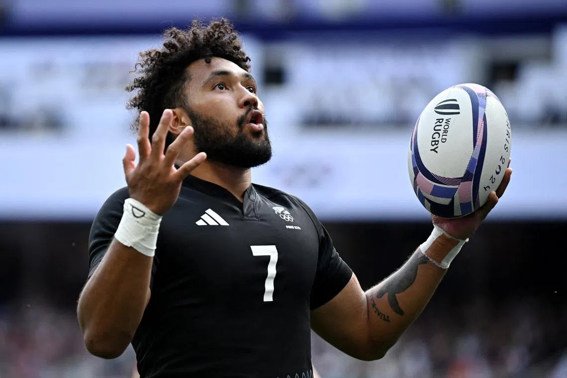 Paris 2024 Olympics - Rugby Sevens - Men's Pool A - New Zealand vs Japan - Stade de France, Saint-Denis, France - July 24, 2024. Fehi Fineanganofo of New Zealand celebrates scoring their second try REUTERS/Dylan Martinez